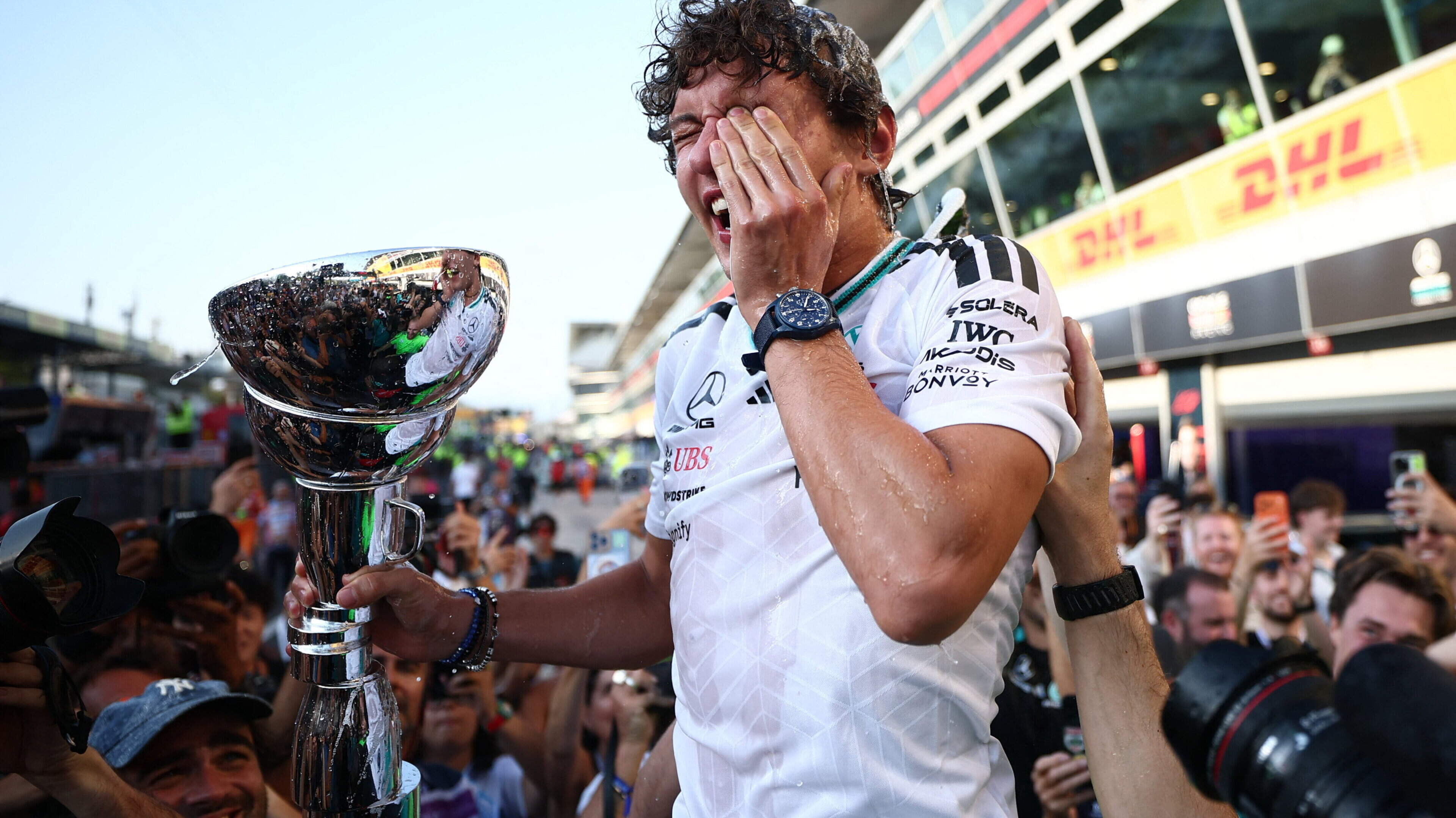 Kimi Antonelli reels in Mercedes team-mate George Russell to win Italian Grand Prix from back row of grid